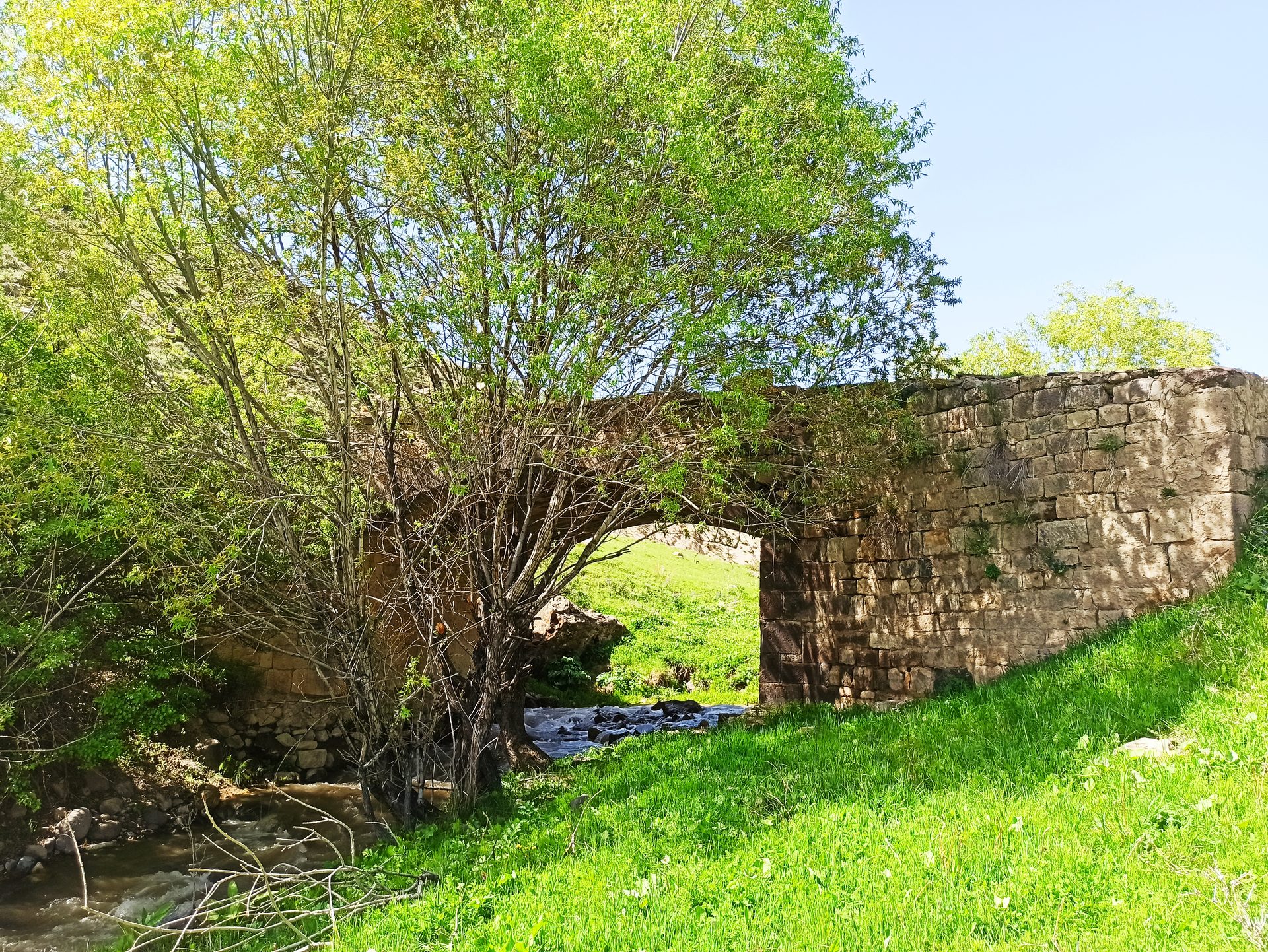 A mountain stream and old bridge